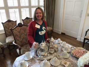 Susan Curry with silver service at Coffee Benefit